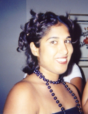 payal wearing mardi gras beads