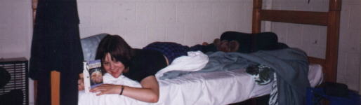 Anna chillin' on her bed, reading A Midsummer Night's Dream
